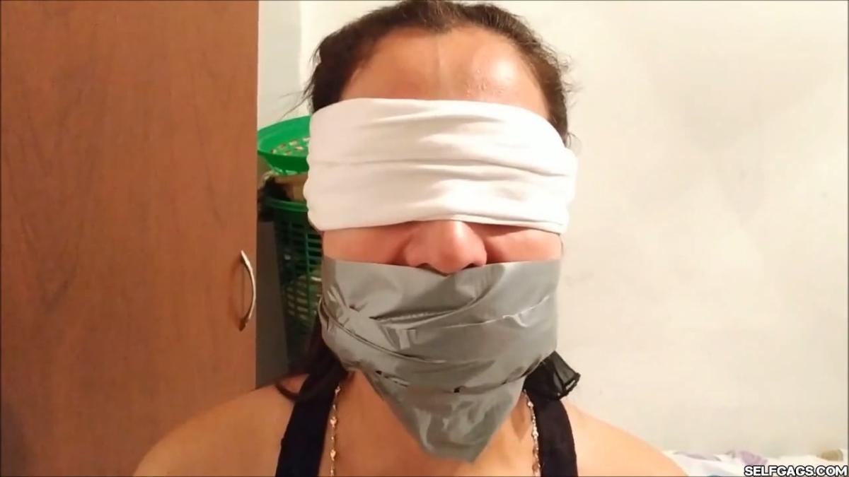 Sexy self-gagged Latina MILF