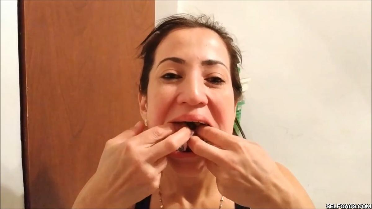 Sexy self-gagged Latina MILF