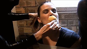 Snooping-Reporter-Bound-And-Gagged-By-Catsuit-Women-12