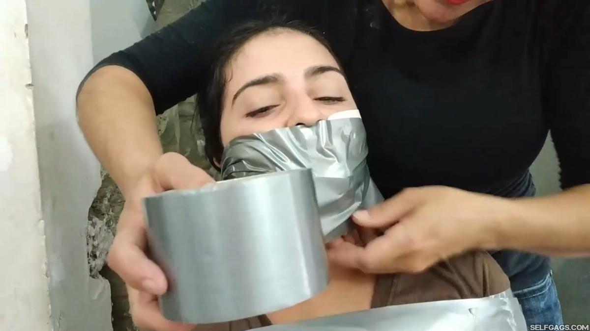 Strongly-Gagged-Women-In-Bondage-32