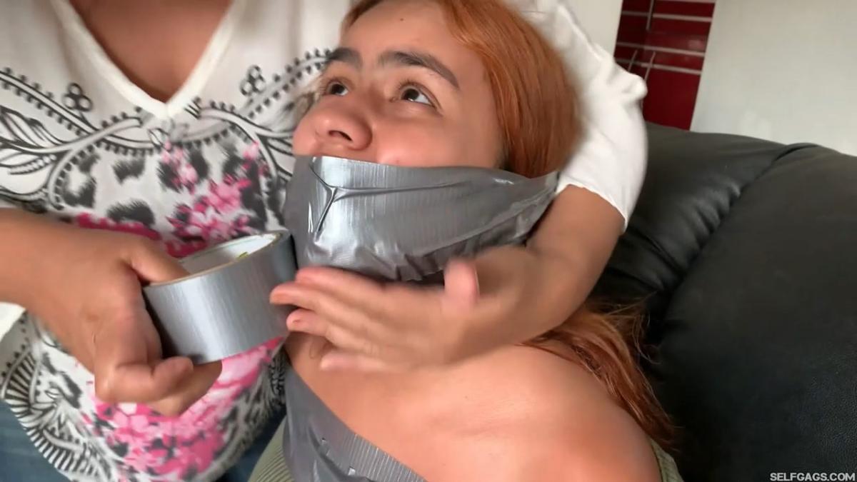 Tape-Bound-Girl-Gagged-In-Barrel-4