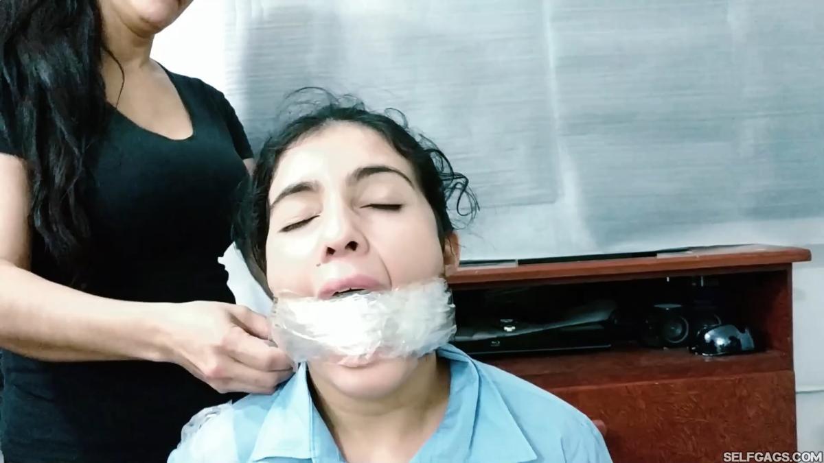 Tape-Selling-Schoolgirls-Ruthlessly-Wrap-Gagged-11