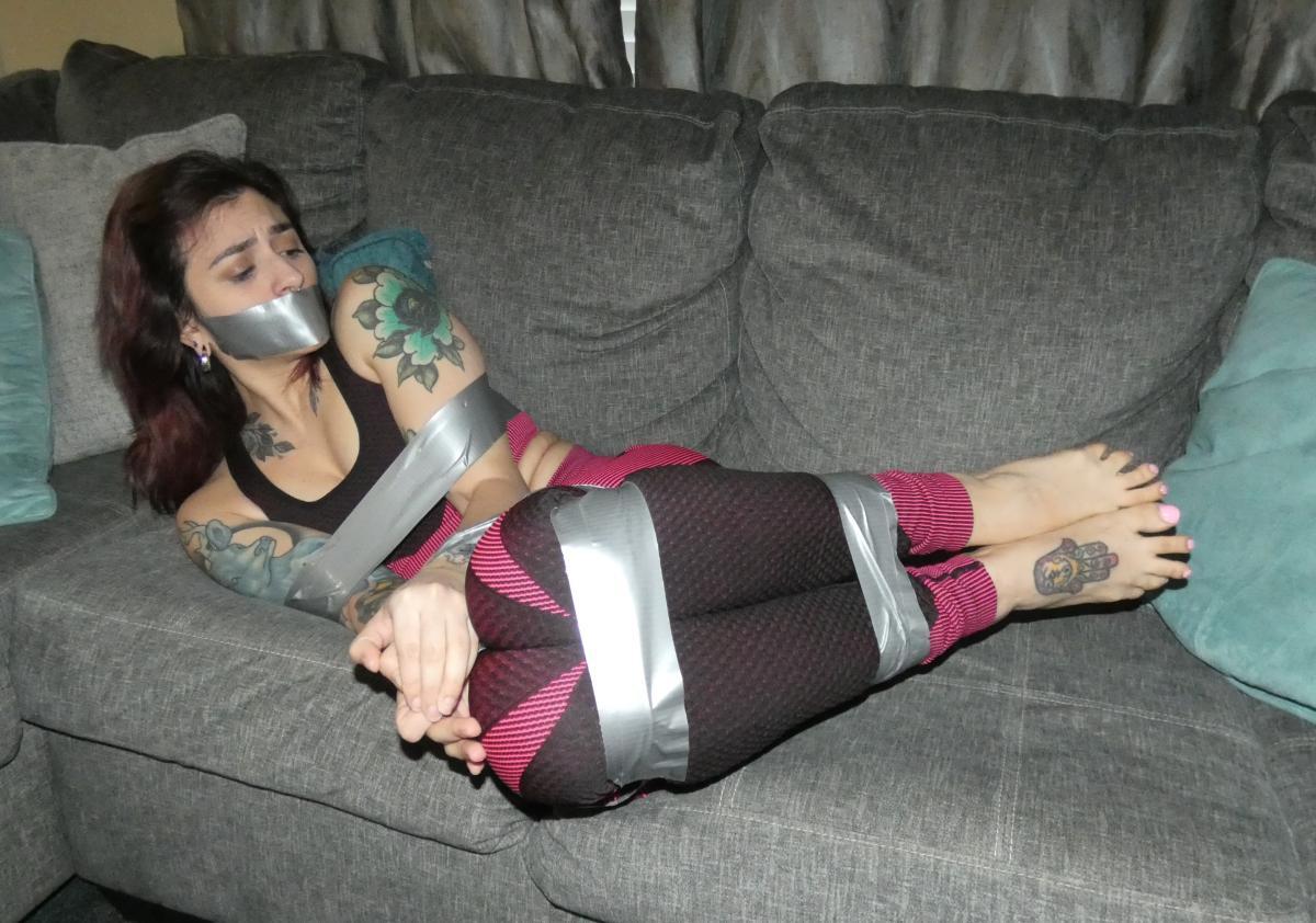 Tattooed-woman-in-tape-bondage-1