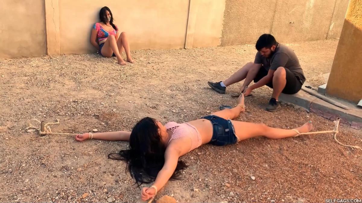 Three-Hot-Girls-Spreadeagle-In-Stakeout-Bondage-11