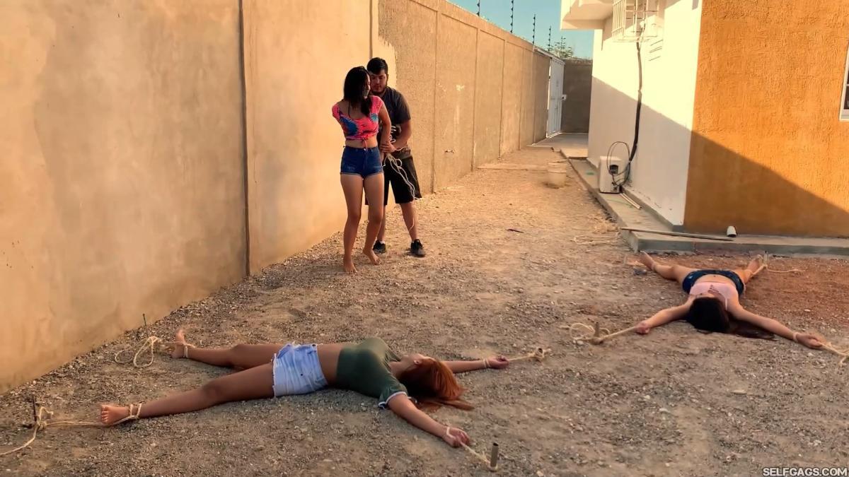 Three-Hot-Girls-Spreadeagle-In-Stakeout-Bondage-13