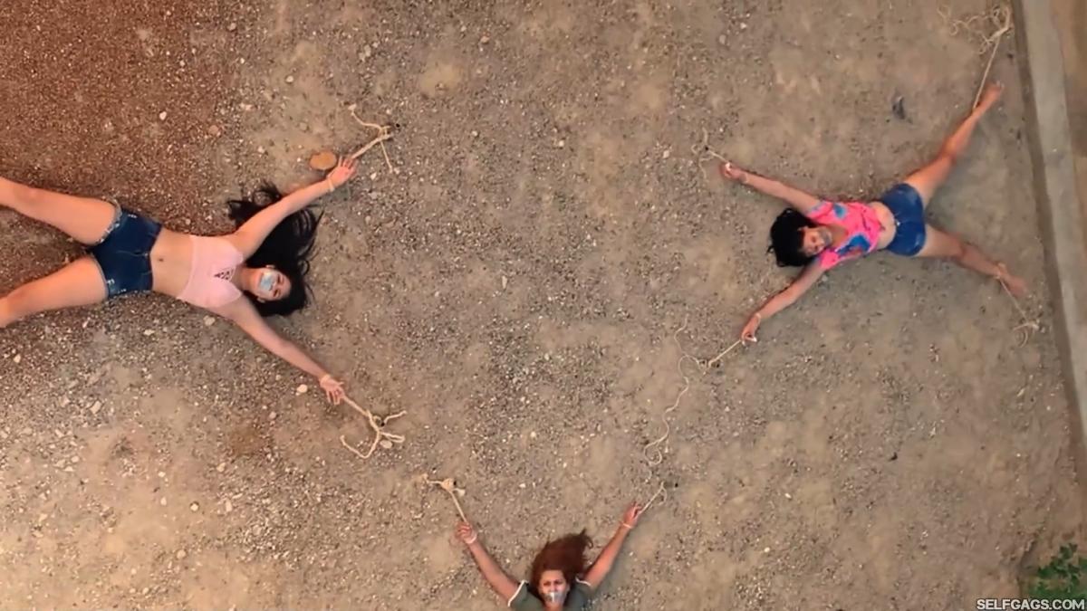 Three-Hot-Girls-Spreadeagle-In-Stakeout-Bondage-15