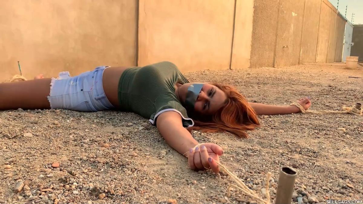 Three-Hot-Girls-Spreadeagle-In-Stakeout-Bondage-17
