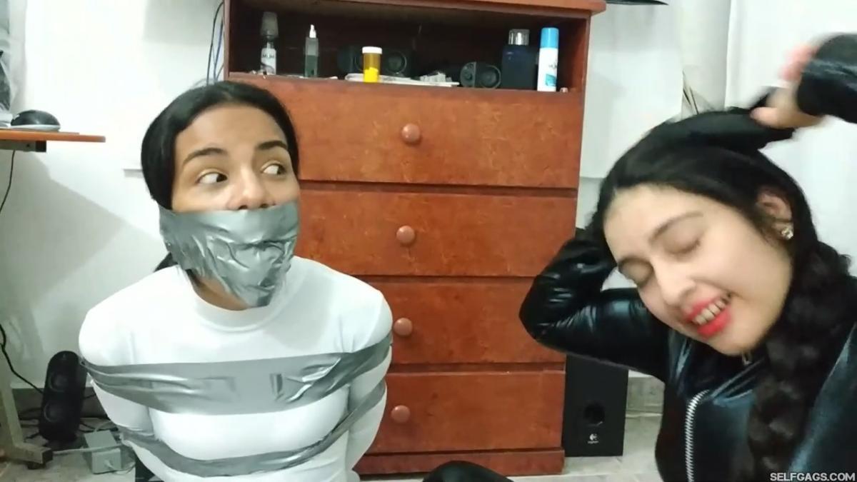 Catsuit girl in bondage