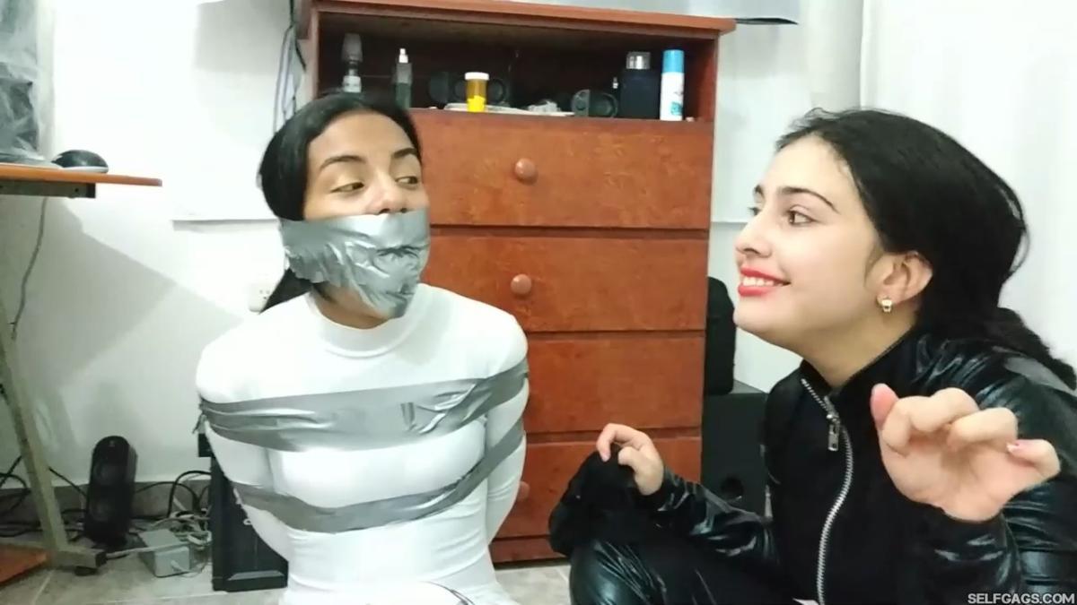 Catsuit girl in bondage