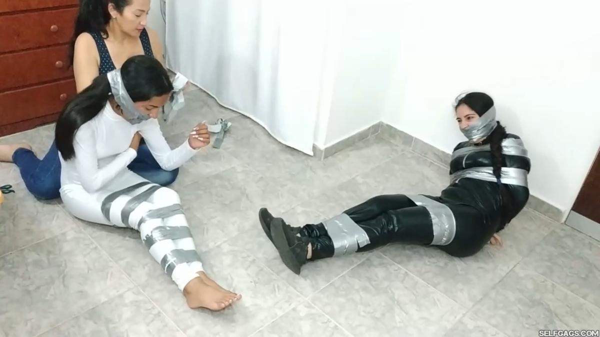 Catsuit girl in bondage