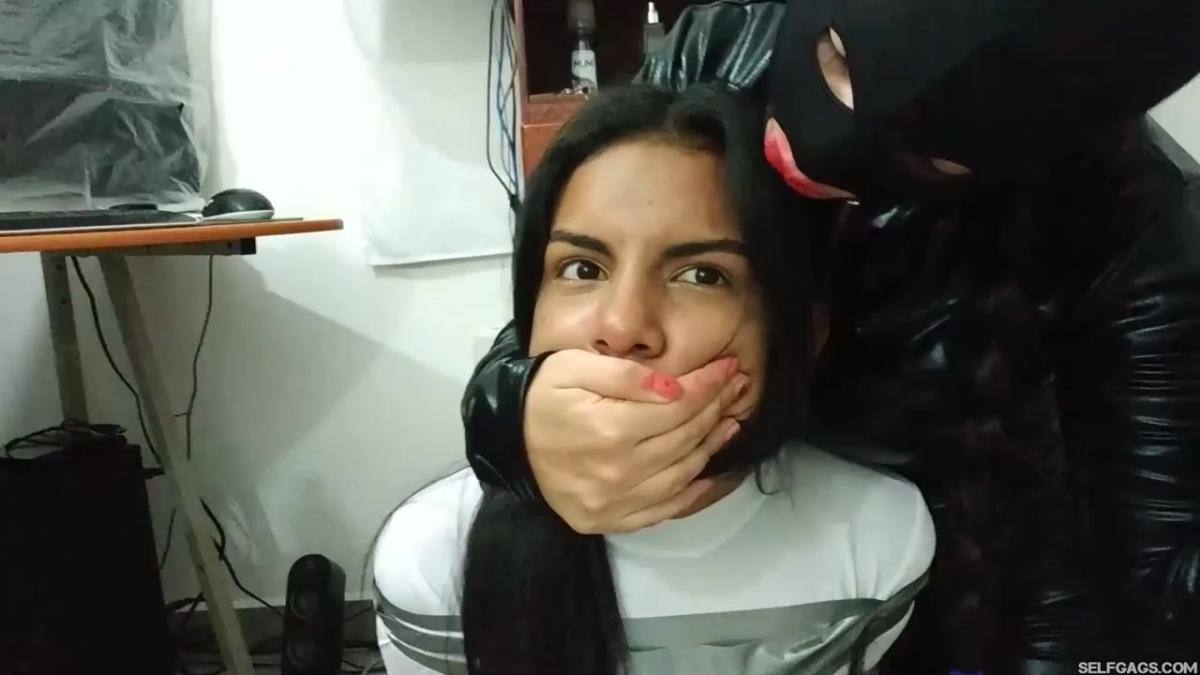 Catsuit girl in bondage