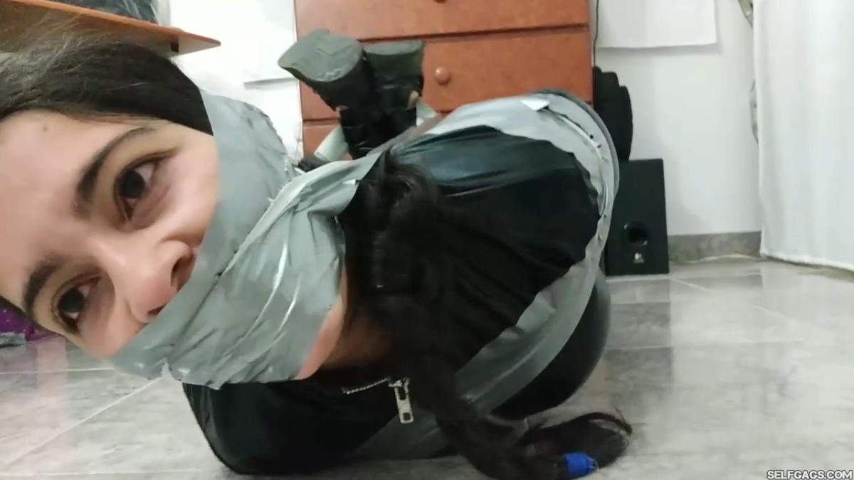 Catsuit girl in bondage