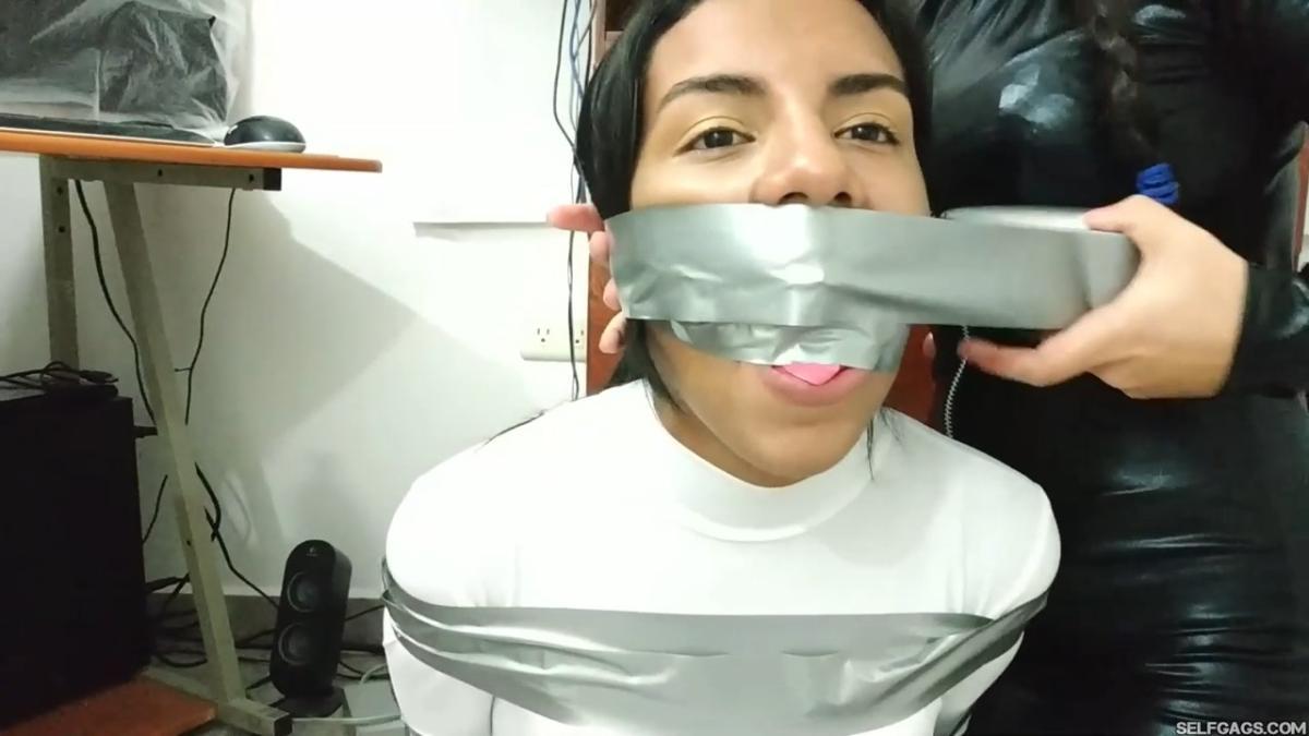 Catsuit girl in bondage