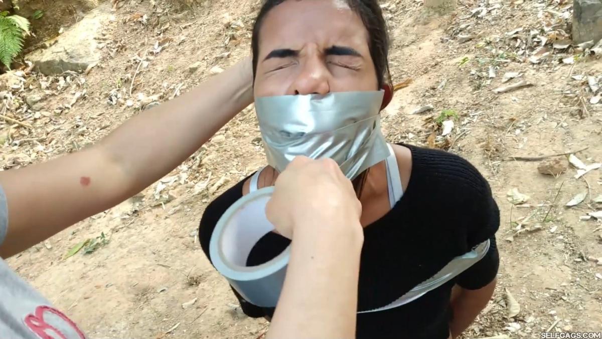 Tresspassing-Girls-Bound-And-Gagged-Outside-5