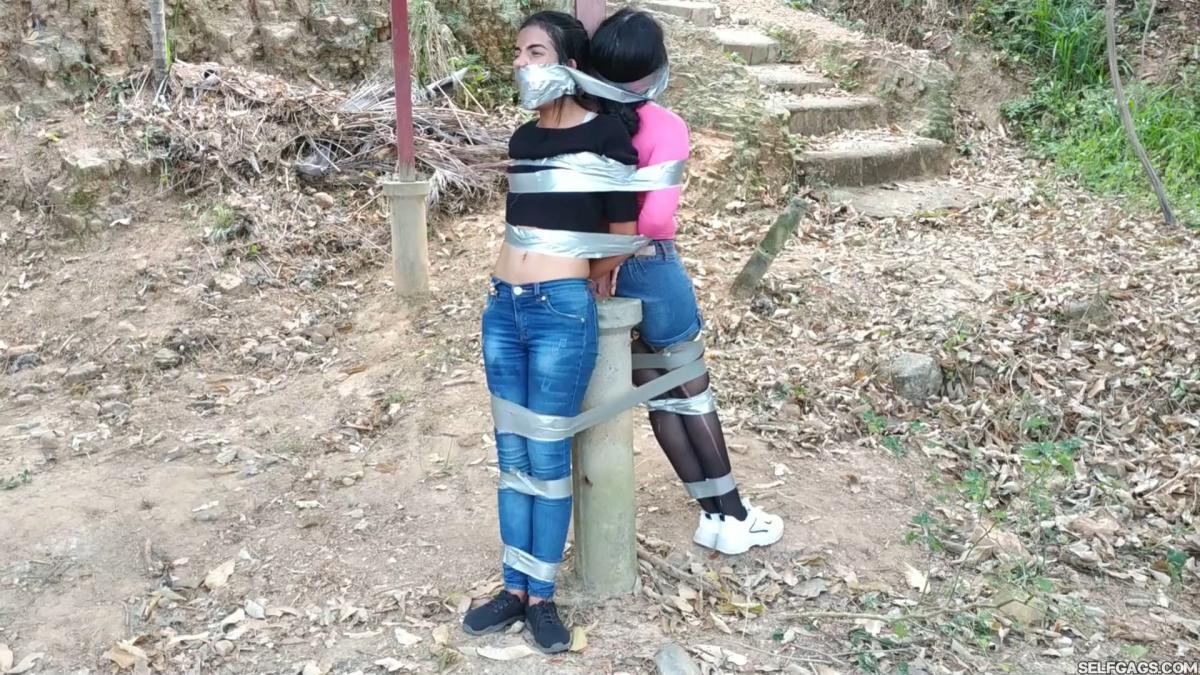 Tresspassing-Girls-Bound-And-Gagged-Outside-7