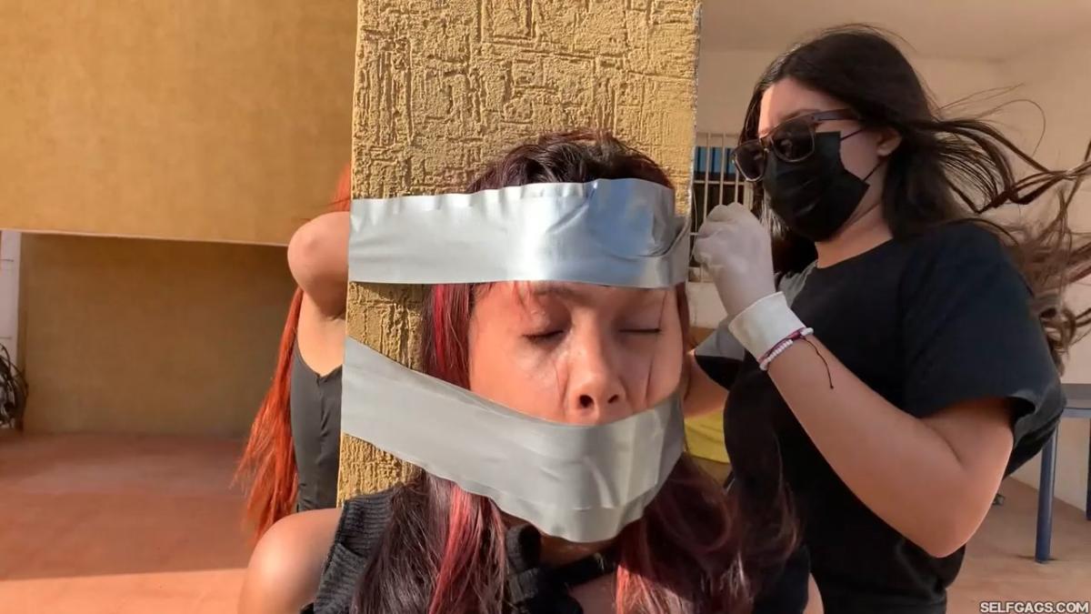 18-year-old girl tied up and gagged by government women