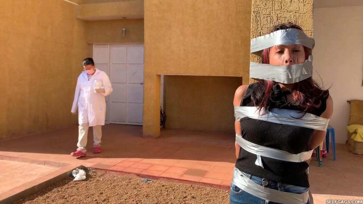 18-year-old girl tied up and gagged by government women