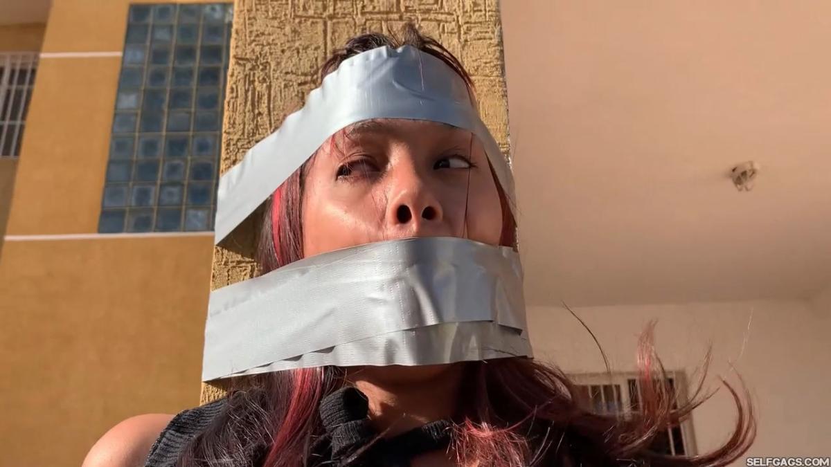 18-year-old girl tied up and gagged by government women