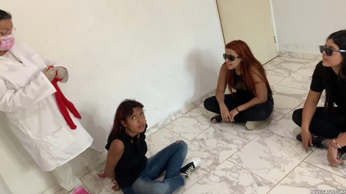 18-year-old girl tied up and gagged by government women