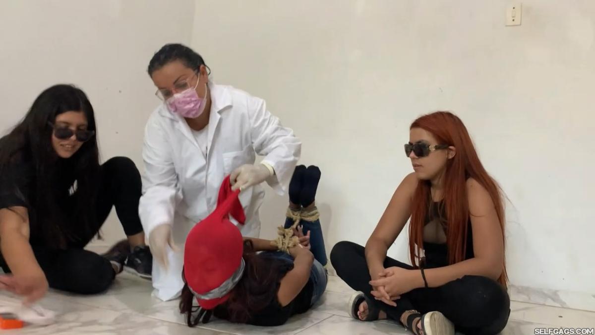 18-year-old girl tied up and gagged by government women