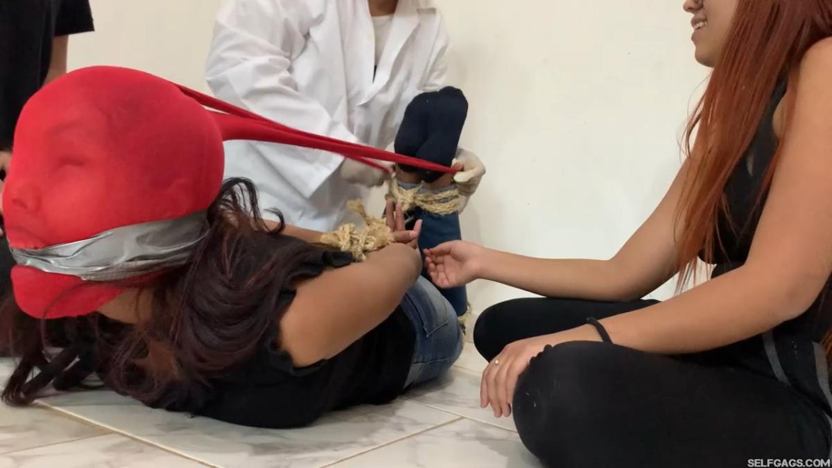 18-year-old girl tied up and gagged by government women