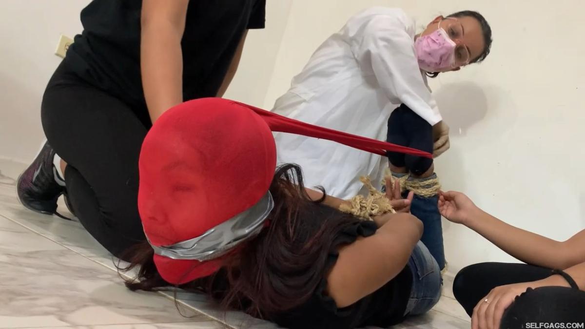 18-year-old girl tied up and gagged by government women