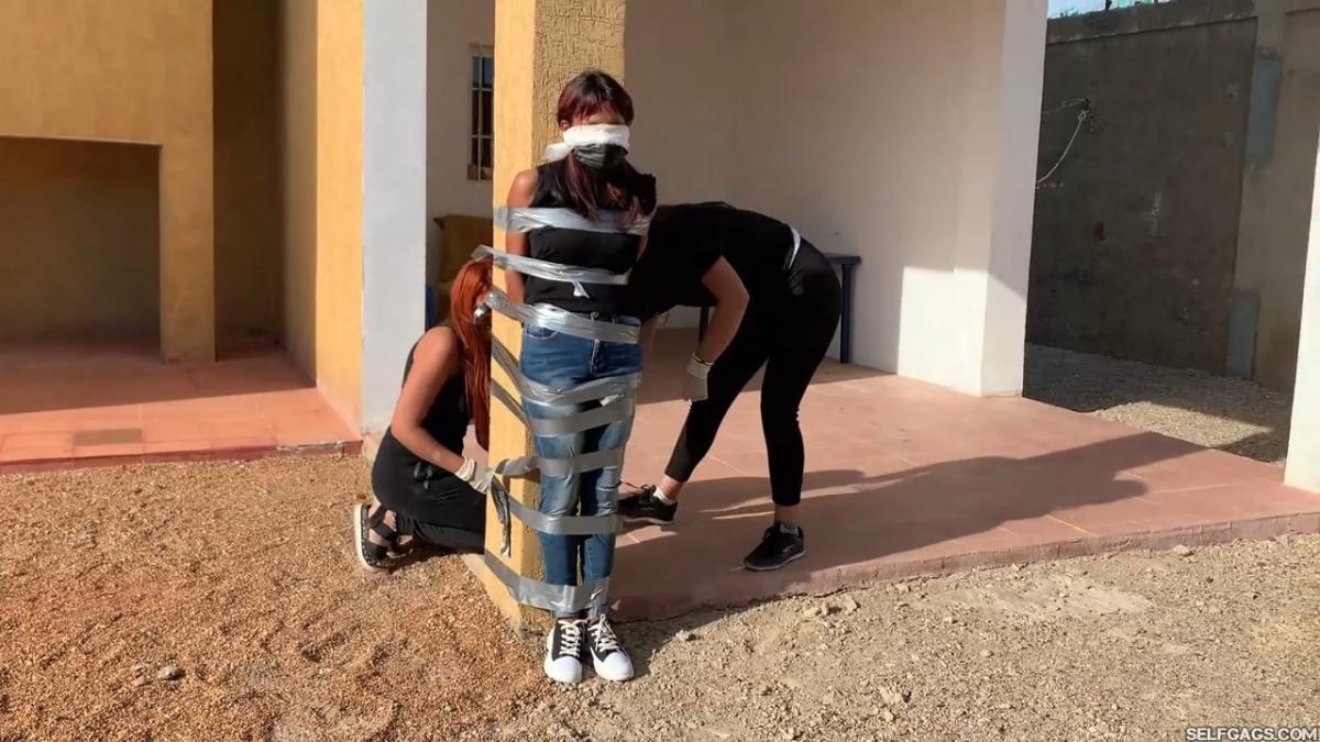 18-year-old girl tied up and gagged by government women