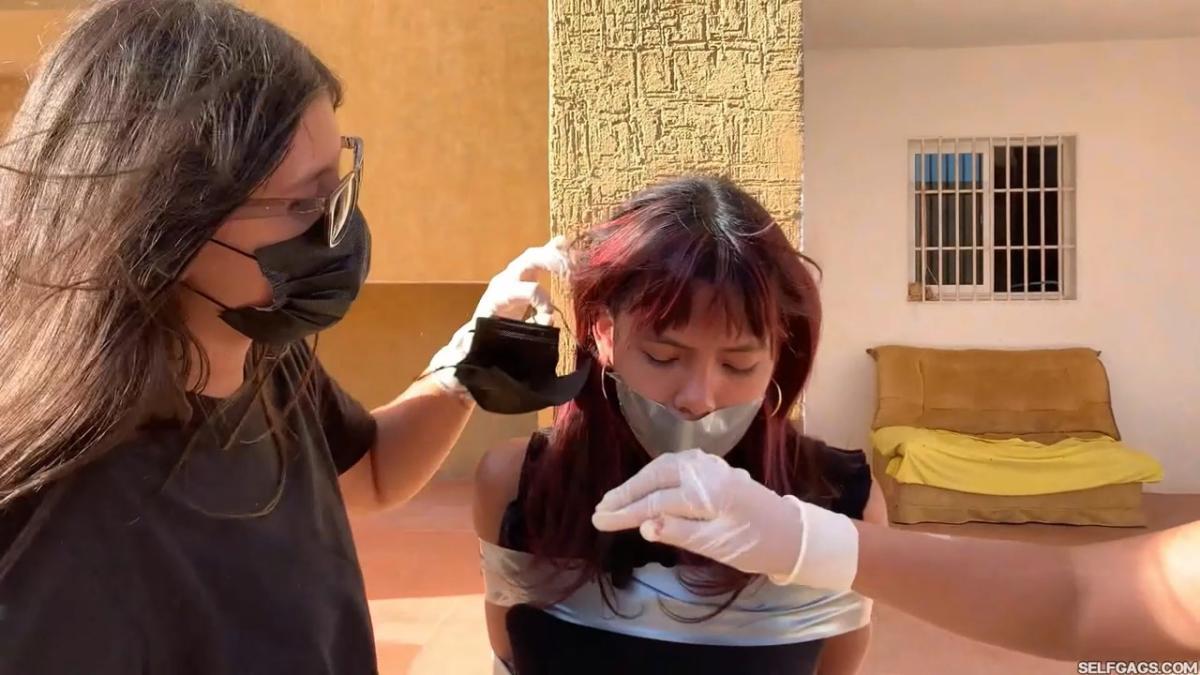 18-year-old girl tied up and gagged by government women