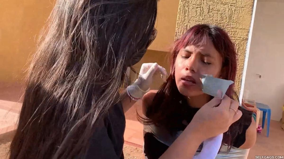 18-year-old girl tied up and gagged by government women