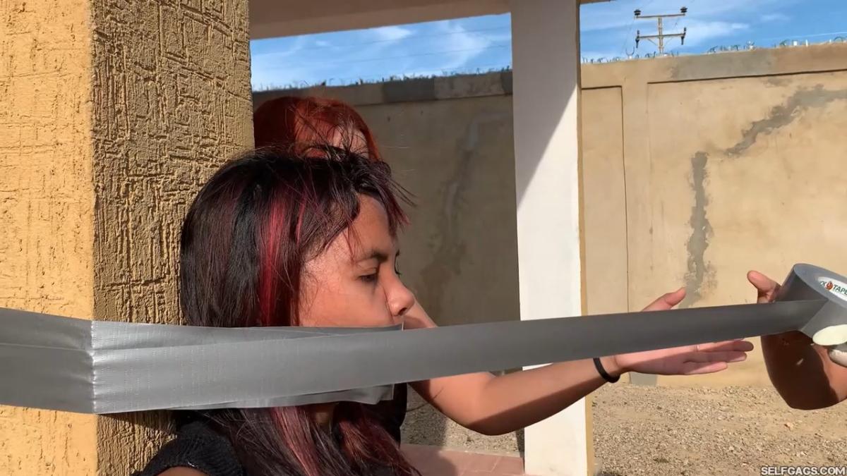 18-year-old girl tied up and gagged by government women