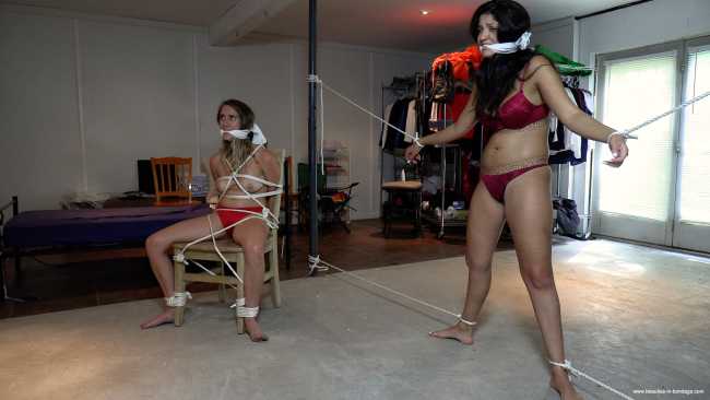 Women tied up and gagged in garage