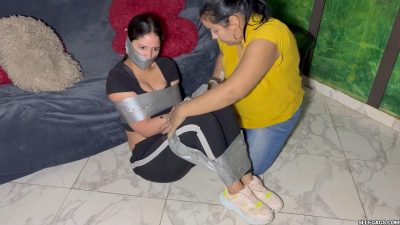 Nana sitting while her legs are heavily duct tape bound Selfgags