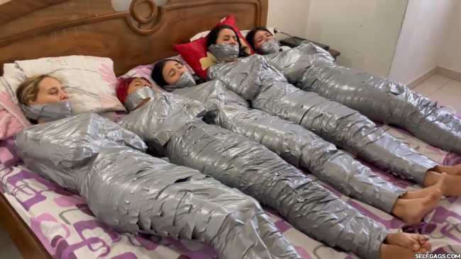 5-Mummified-Girls-Wrapped-Up-Tight-26