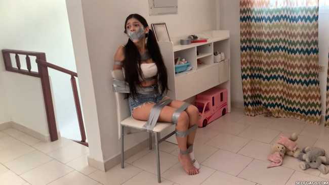 Bound-Babysitter-Gagged-And-Frustrated-10