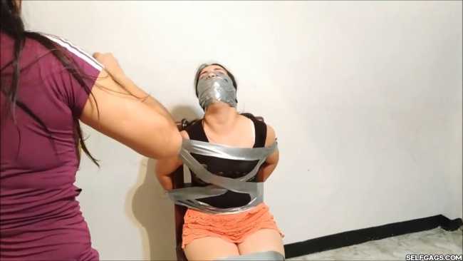 Chair-Taped-With-Bridged-OTN-Tape-Gag-22