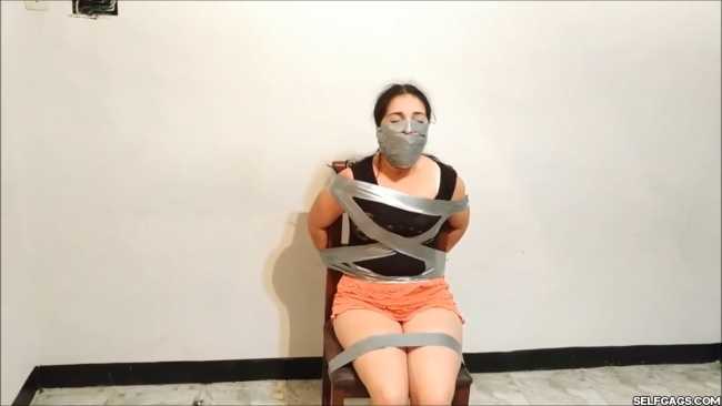 Chair-Taped-With-Bridged-OTN-Tape-Gag-28