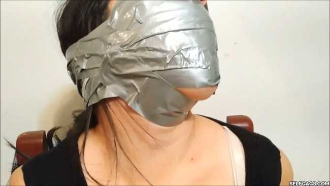 Chair-Taped-With-Bridged-OTN-Tape-Gag-33