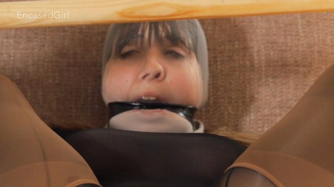 Cherry-English-Nylon-Hooded-Cuffed-Wooden-Stick-In-Exposed-Pussy-EncasedGirl-4