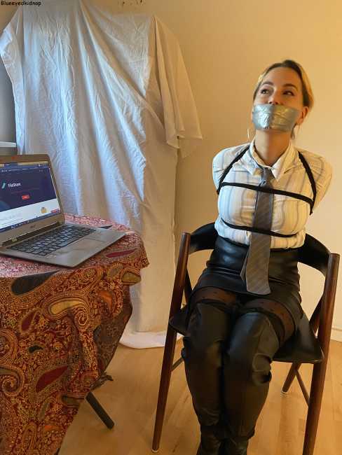 Danish-Office-Girl-Bound-And-Gagged-In-Leather-Boots-2