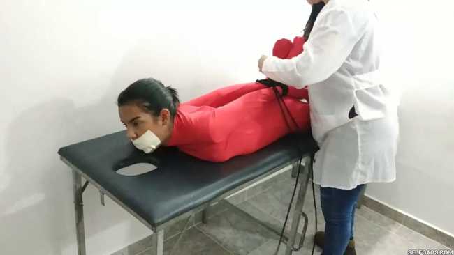 Female-patient-treated-with-bondage-by-doctor-10