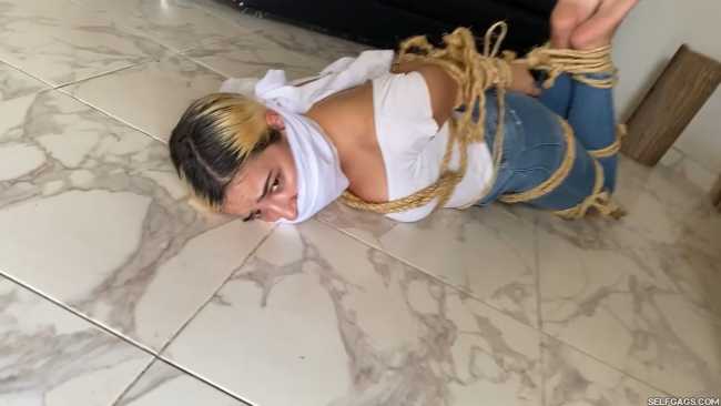 Blonde girl bound and gagged for the first time