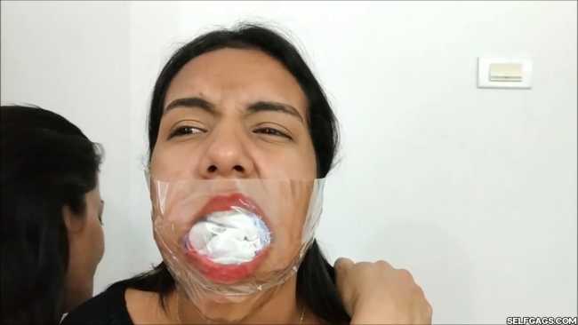 Gagged-With-Clear-Tape-Mouth-Stuffed-With-Multiple-Socks-29