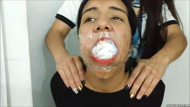 Gagged-With-Clear-Tape-Mouth-Stuffed-With-Multiple-Socks-31