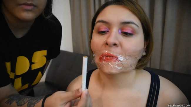 Girl-Gagged-With-Clear-Tape-And-Made-To-Smoke-Cigarette-2