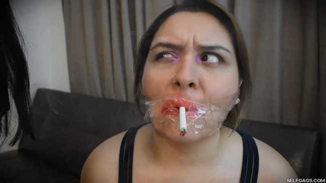 Girl-Gagged-With-Clear-Tape-And-Made-To-Smoke-Cigarette-4