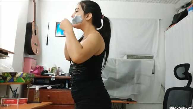 Girl-Gives-Duct-Tape-Gagged-Handjob-With-Cum-On-Face-6