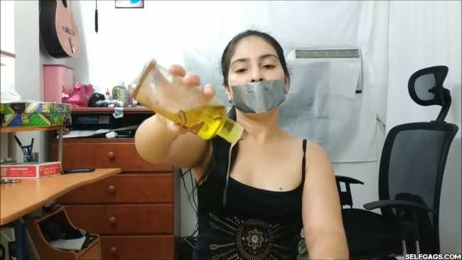 Girl-Gives-Duct-Tape-Gagged-Handjob-With-Cum-On-Face-8