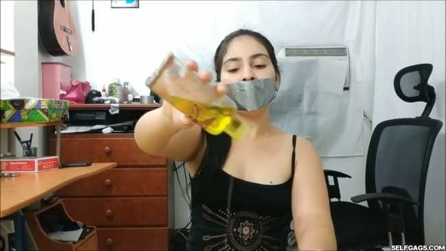 Girl-Gives-Duct-Tape-Gagged-Handjob-With-Cum-On-Face-9