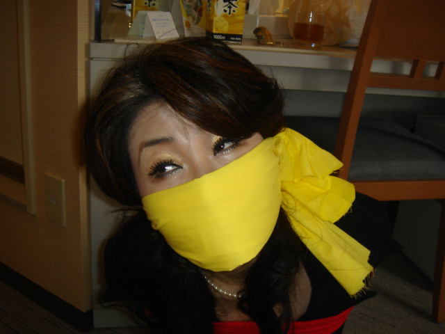 Girl-OTN-Gagged-With-Scarf-12