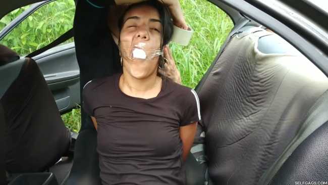 Jogger-Bound-And-Gagged-In-Backseat-Of-Car-2